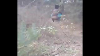 Desi girl caught pissing outdoor